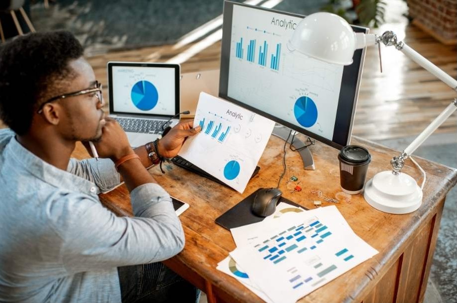 A person using an analytical mindset to study data.