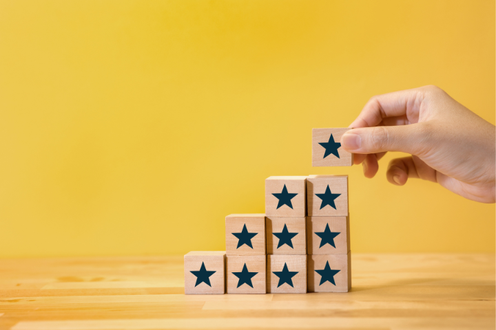 Stacked wooden blocks with stars.